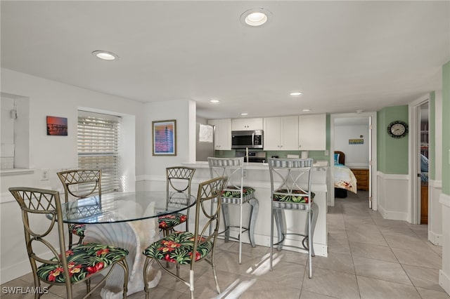 view of tiled dining space