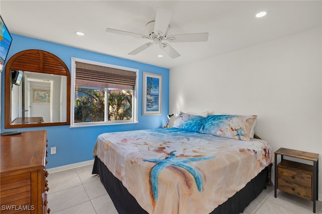 tiled bedroom with ceiling fan