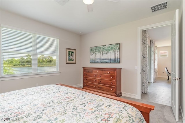 bedroom featuring ceiling fan and carpet floors