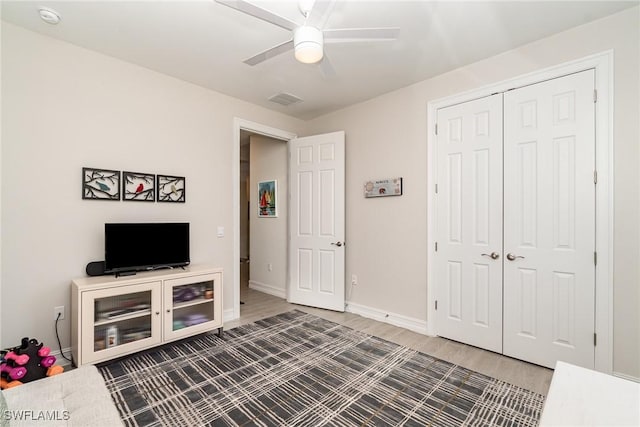 interior space featuring hardwood / wood-style flooring and ceiling fan