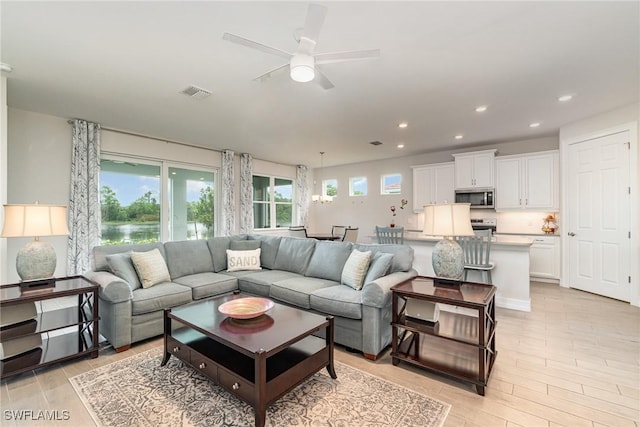 living room featuring ceiling fan