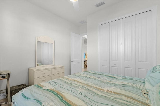 bedroom featuring ceiling fan and a closet