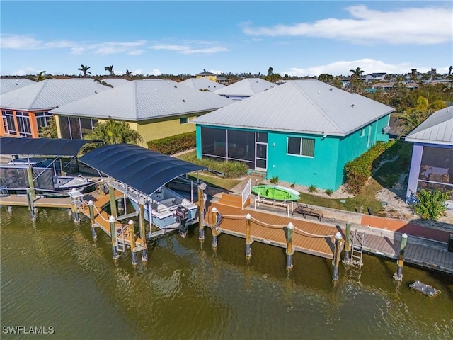 dock area with a water view