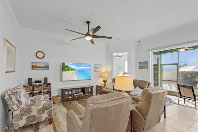 living room featuring ceiling fan, light tile patterned floors, and crown molding