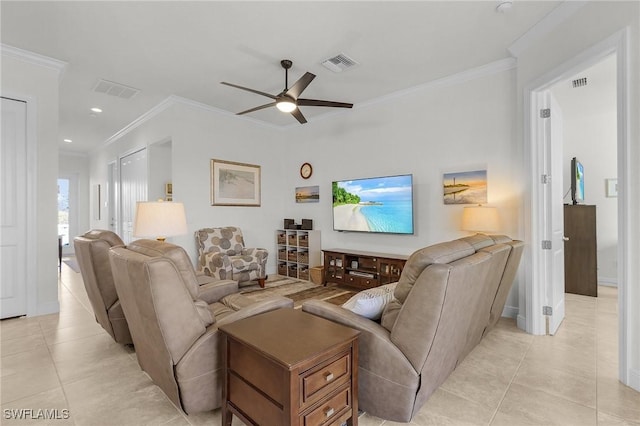 living room featuring ceiling fan, light tile patterned floors, and ornamental molding