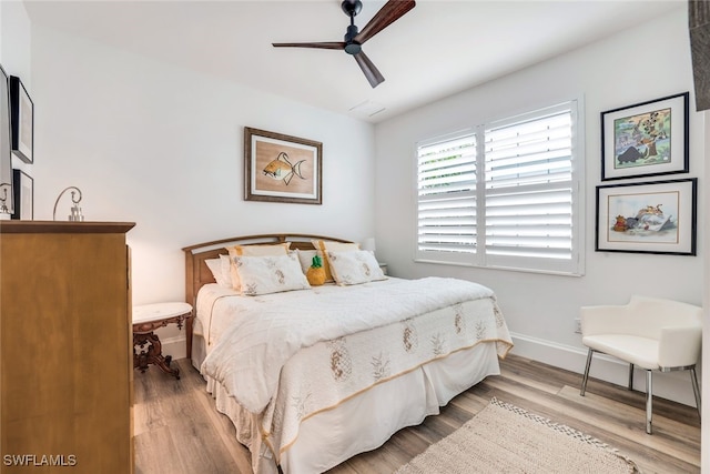 bedroom featuring ceiling fan and light wood-type flooring