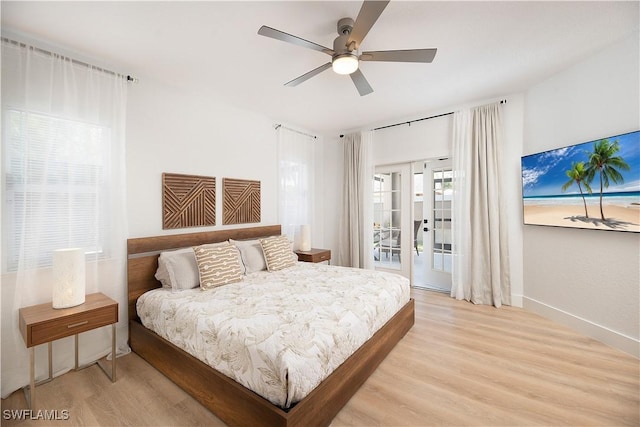 bedroom with ceiling fan, light wood-type flooring, and access to outside