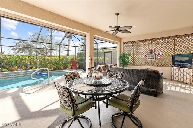 interior space featuring ceiling fan and a pool