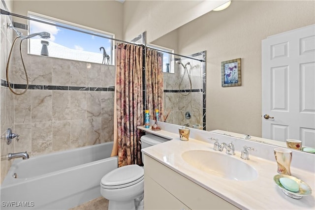 full bathroom featuring toilet, vanity, and shower / bathtub combination with curtain