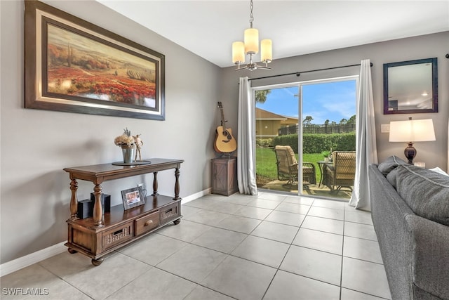 entryway with light tile patterned floors and a notable chandelier