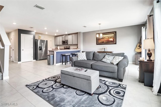 living room with light tile patterned floors