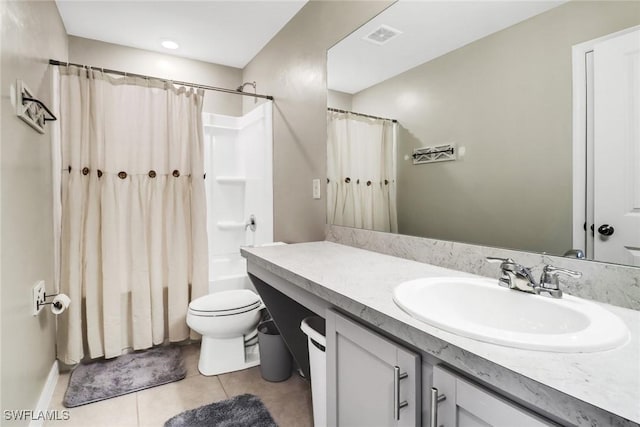 full bathroom with tile patterned flooring, vanity, shower / bath combination with curtain, and toilet