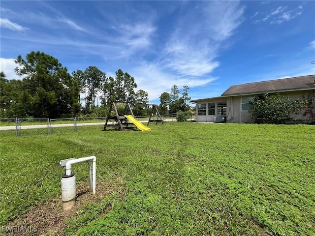 view of yard featuring a playground