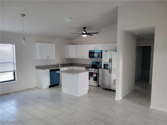 kitchen featuring pendant lighting, white cabinets, ceiling fan, appliances with stainless steel finishes, and a kitchen island