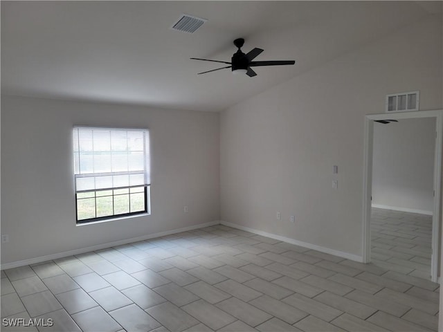 tiled empty room with ceiling fan