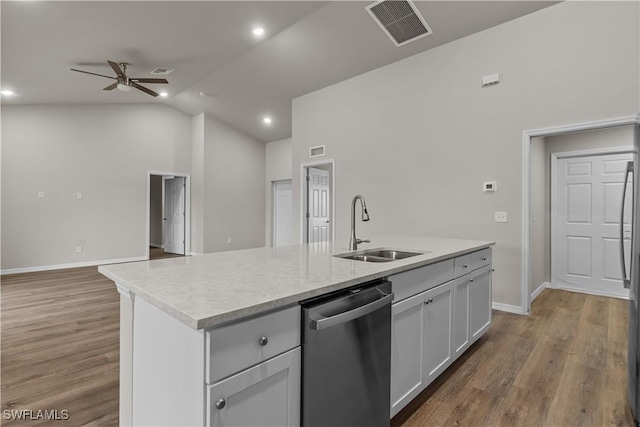 kitchen featuring sink, white cabinets, dishwasher, ceiling fan, and a center island with sink