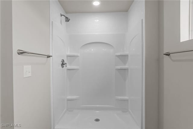 bathroom with walk in shower