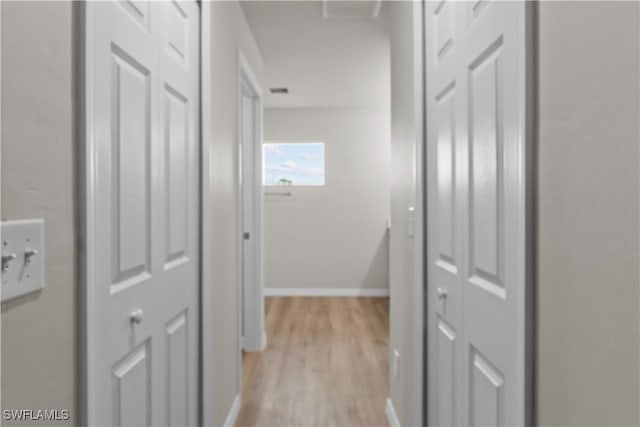 hall featuring light hardwood / wood-style flooring