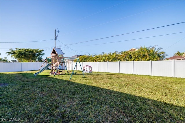 view of yard with a playground