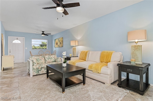 living room featuring ceiling fan