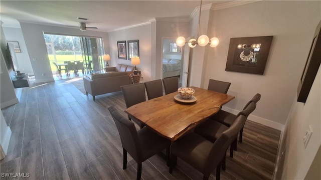 dining area with ceiling fan, dark hardwood / wood-style floors, and ornamental molding