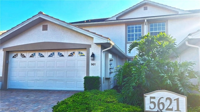 view of front of home with a garage