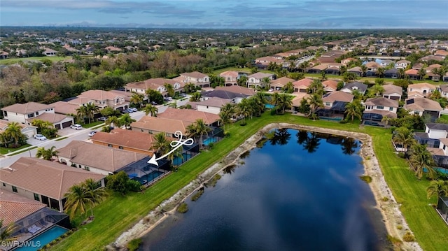 aerial view with a water view and a residential view