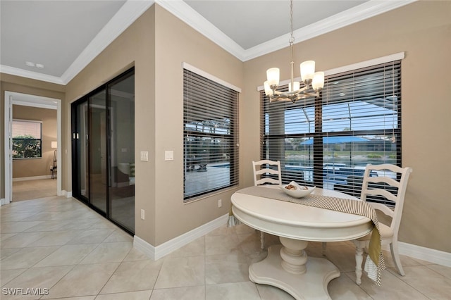 dining room featuring light tile patterned floors, an inviting chandelier, baseboards, and crown molding