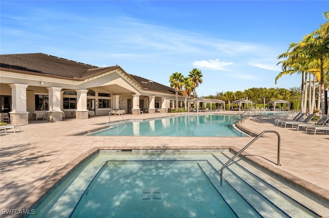 community pool with a patio