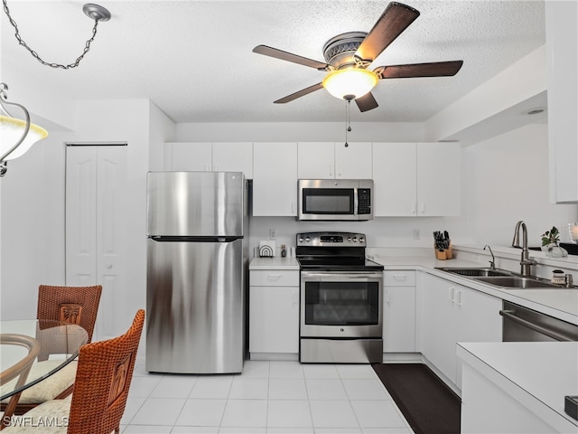 kitchen featuring sink, white cabinetry, ceiling fan, and appliances with stainless steel finishes