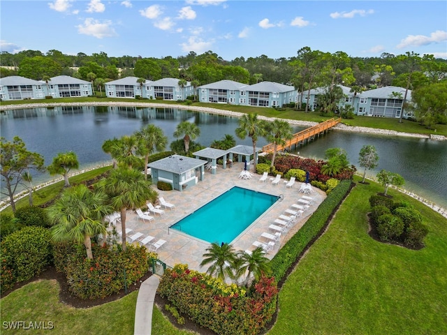 view of pool featuring a water view, a gazebo, a lawn, and a patio area