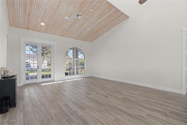 unfurnished room with french doors, light hardwood / wood-style flooring, ceiling fan, and wooden ceiling