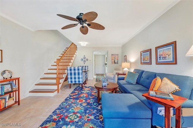 living room with ornamental molding and ceiling fan