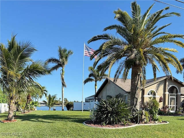 view of yard with a water view