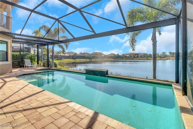 pool featuring a water view, glass enclosure, and a patio