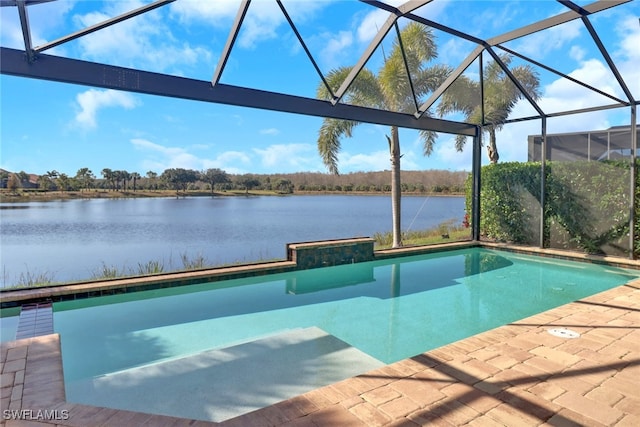 outdoor pool with a patio area, a water view, and a lanai