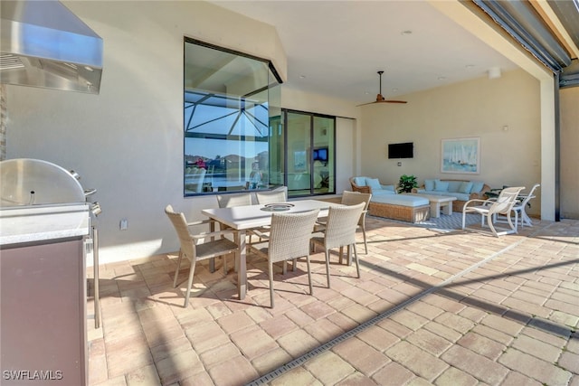 view of patio / terrace featuring a ceiling fan, outdoor dining area, an outdoor living space, and area for grilling