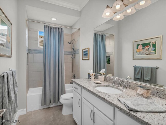 full bathroom with toilet, vanity, shower / bath combo with shower curtain, and ornamental molding