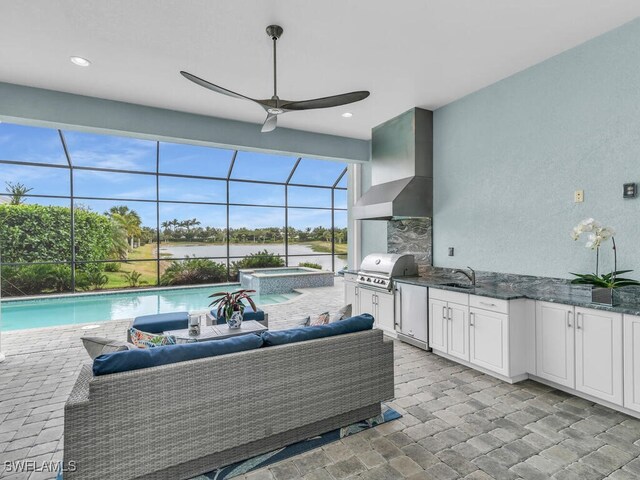 view of patio / terrace featuring glass enclosure, an outdoor hangout area, a grill, area for grilling, and sink