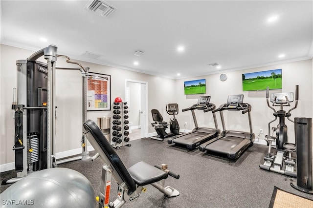 exercise room featuring crown molding