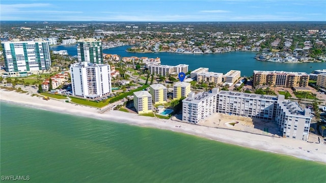 aerial view with a beach view and a water view