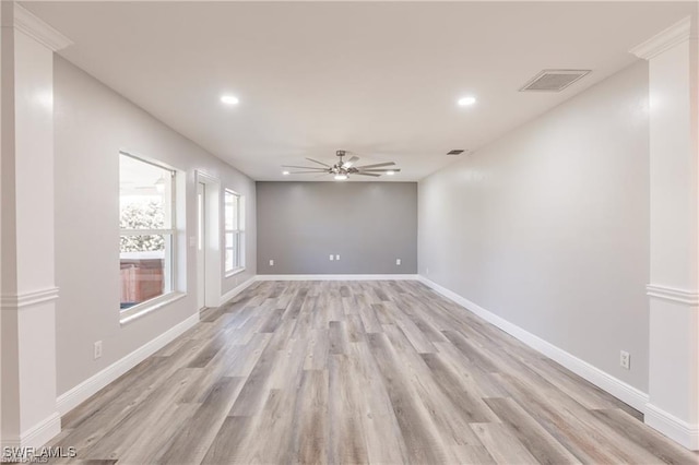 unfurnished room featuring ceiling fan and light hardwood / wood-style flooring