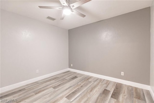 unfurnished room with ceiling fan and light hardwood / wood-style flooring