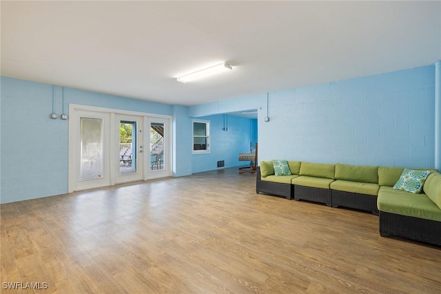 unfurnished living room with light wood-type flooring