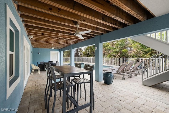 view of patio with ceiling fan