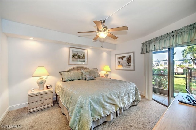 bedroom featuring access to outside, ceiling fan, and light colored carpet