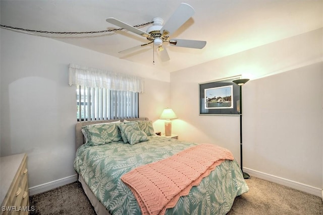 bedroom featuring ceiling fan and carpet floors