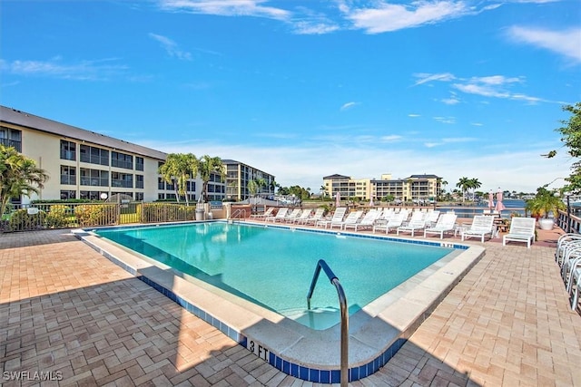 view of swimming pool featuring a patio area