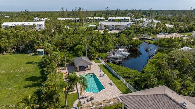 birds eye view of property with a water view