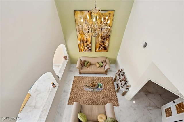 recreation room featuring a chandelier